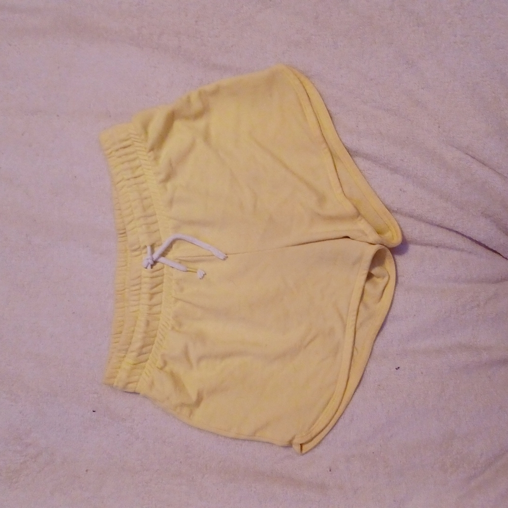 Yellow cat & jack shorts in size 14/16